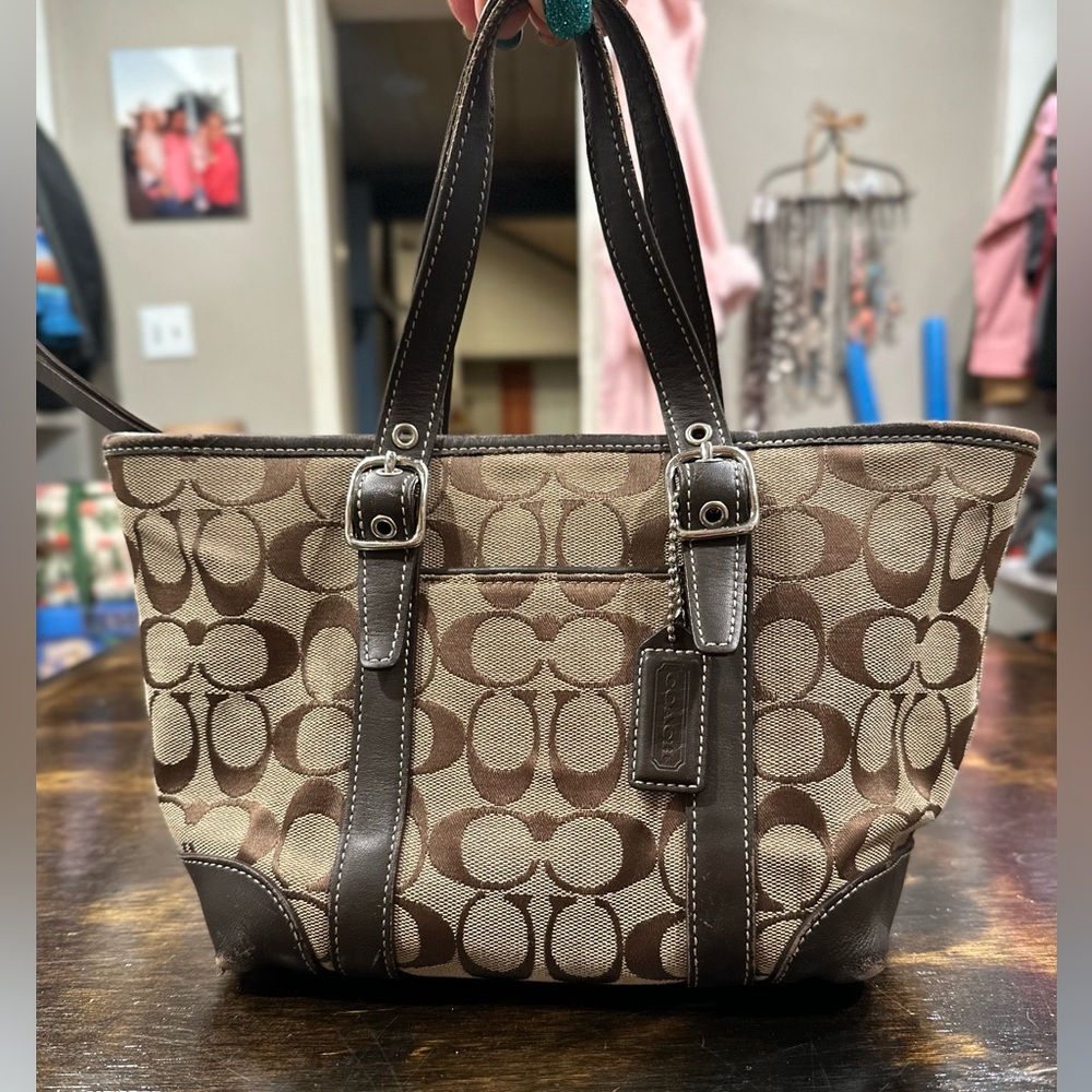 Brown coach purse.